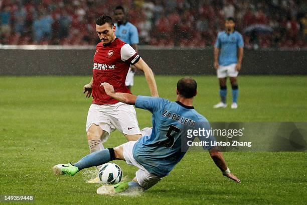Thomas Vermaelen of Arsenal FC in action with Pablo Zabaleta of Manchester City during the pre-season Asian Tour friendly match between Arsenal and...