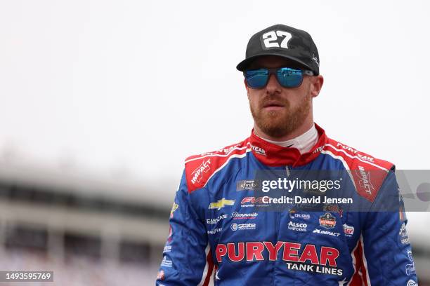 Jeb Burton, driver of the Puryear Tank Lines Chevrolet, walks the grid during qualifying for the NASCAR Xfinity Series Alsco Uniforms 300 at...