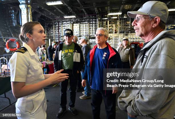 San Pedro, CA Lt. Ada Willis chats with guests aboard the USS CINCINNATI one of three active U.S. Navy ships available to tour at LA Fleet Week in...