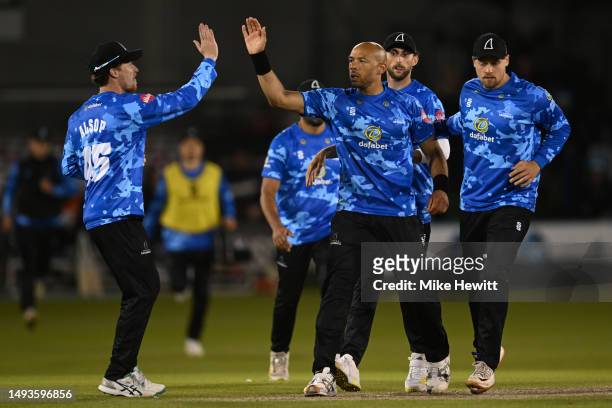 Tymal Mills of Sussex celebrates with team mates after dismissing Tom Lammonby of Somerset during the Vitality Blast T20 match between Sussex Sharks...