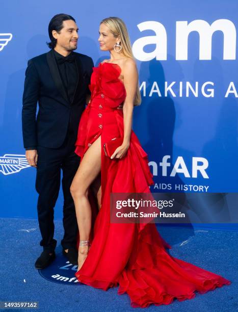 Benjamin Larretche and Petra Nemcova attend the amfAR Cannes Gala 2023 at Hotel du Cap-Eden-Roc on May 25, 2023 in Cap d'Antibes, France.