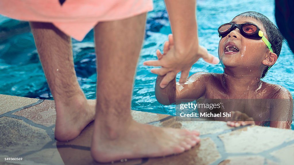 Boy In Swimming Pool High Res Stock Photo Getty Images boy-in-swimming-pool-high-res-stock-photo-getty-images