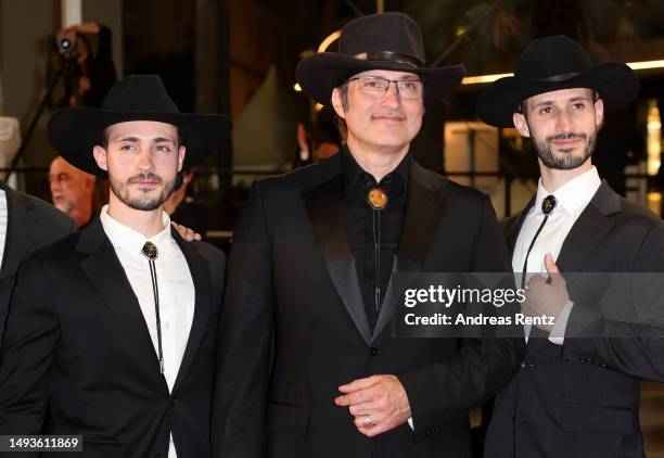 Rebel Rodriguez, Director Robert Rodriguez and Racer Rodriguez attend the "Hypnotic" red carpet during the 76th annual Cannes film festival at Palais...