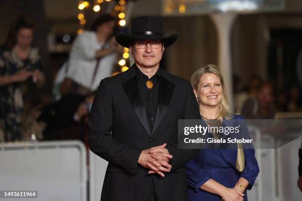 Director Robert Rodriguez and guest attend the "Hypnotic" red carpet during the 76th annual Cannes film festival at Palais des Festivals on May 26,...
