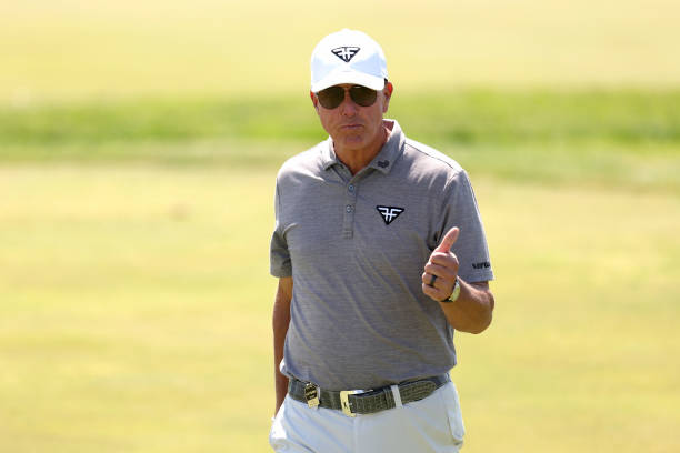 Phil Mickelson of HyFlyers GC gives the thumbs up while walking to the ninth green during day one of the LIV Golf Invitational - DC at Trump National...