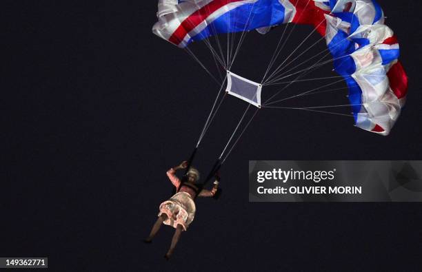 An actor dressed to resemble Britain's Queen Elizabeth II parachutes into the stadium during the opening ceremony of the London 2012 Olympic Games at...