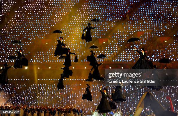 Performers in the role of Mary Poppins float inside the stadium during the Opening Ceremony of the London 2012 Olympic Games at the Olympic Stadium...