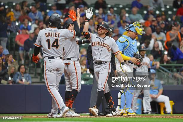 Brett Wisely of the San Francisco Giants celebrates a three run home run against the Milwaukee Brewers during the third inning at American Family...