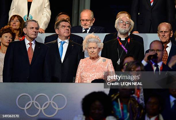 Britain Queen Elizabeth II arrives during the opening ceremony of the London 2012 Olympic Games on July 27, 2012 at the Olympic stadium in London....