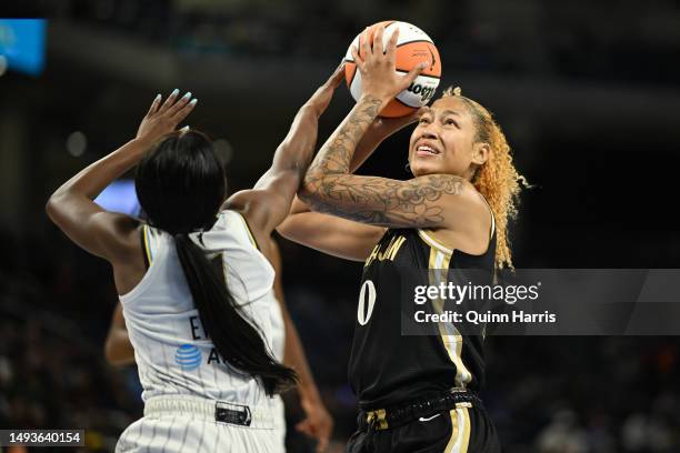 Shakira Austin of the Washington Mystics shoots in the second half against Dana Evans of the Chicago Sky at Wintrust Arena on May 26, 2023 in...