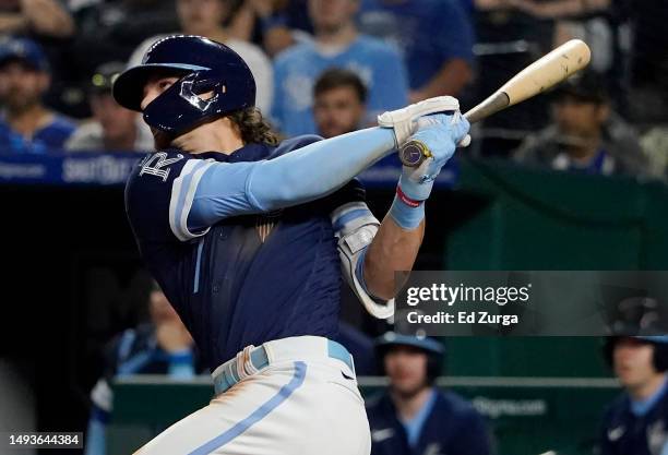 Bobby Witt Jr. #7 of the Kansas City Royals hits a three-run home run in the seventh inning against the Washington Nationals at Kauffman Stadium on...