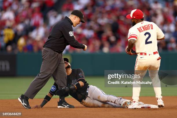 Luis Rengifo of the Los Angeles Angels catches Luis Arraez of the Miami Marlins stealing second base during the third inning at Angel Stadium of...