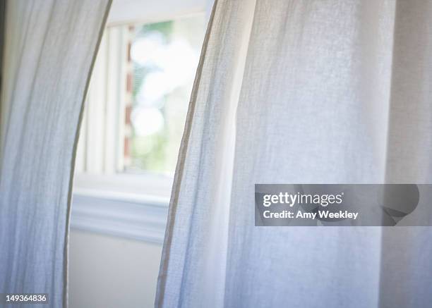 breezy window - opening the curtains stock pictures, royalty-free photos & images