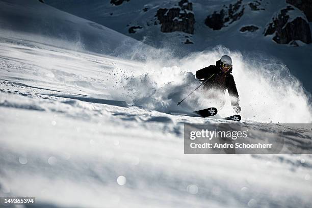 skier in deep snow - freestyle skiing stockfoto's en -beelden