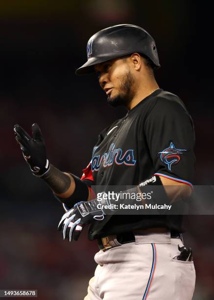 Luis Arraez of the Miami Marlins celebrates his RBI single during the eighth inning against the Los Angeles Angels at Angel Stadium of Anaheim on May...