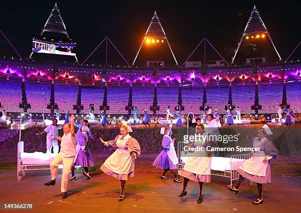 Children and Nurses representing the Great Ormond Street Hospital, the NHS and children literature take part in the Opening Ceremony of the London...
