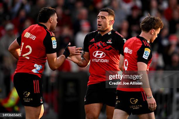 David Havili of the Crusaders celebrates with Codie Taylor after scoring a try during the round 14 Super Rugby Pacific match between Crusaders and...