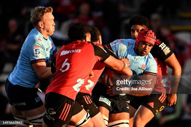 Langi Gleeson of the Waratahs charges forward during the round 14 Super Rugby Pacific match between Crusaders and NSW Waratahs at Orangetheory...