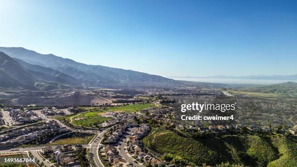 drone flight in southern california - urban sprawl forest stock pictures, royalty-free photos & images