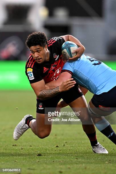 Leicester Fainga'anuku of the Crusaders charges forward during the round 14 Super Rugby Pacific match between Crusaders and NSW Waratahs at...