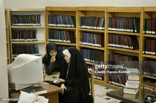 Iranian female students study at the Faculty of Engineering at the University of Tehran, May 30, 2005. University of Tehran, is the oldest and...