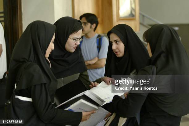 Iranian female students study at the Faculty of Engineering in the University of Tehran, May 30, 2005. University of Tehran, is the oldest and...