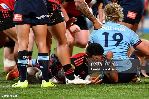 Sione Havili Talitui of the Crusaders scores a try during the round 14 Super Rugby Pacific match between Crusaders and NSW Waratahs at Orangetheory...