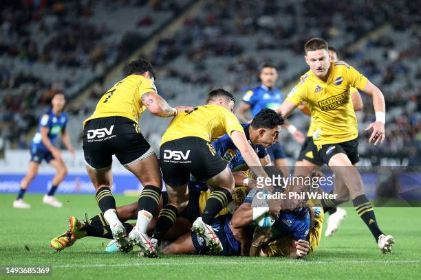 Mark Telea of the Blues scores a try during the round 14 Super Rugby Pacific match between Blues and Hurricanes at Eden Park, on May 27 in Auckland,...