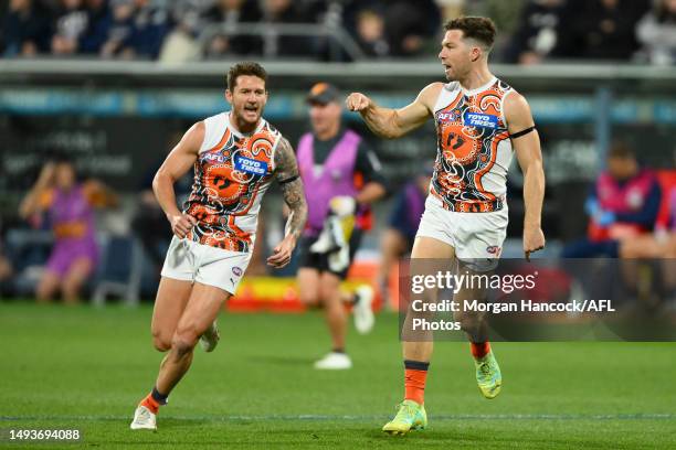 Toby Greene of the Giants celebrates a goal during the round 11 AFL match between Geelong Cats and Greater Western Sydney Giants at GMHBA Stadium, on...