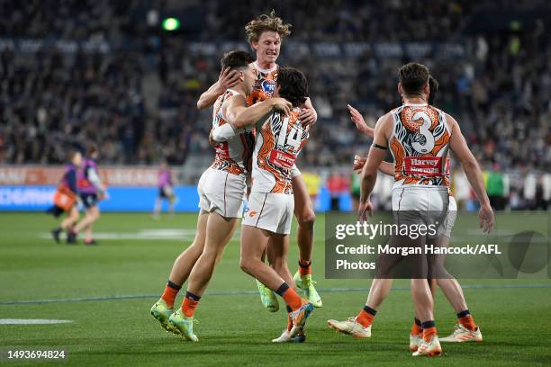 Toby Greene of the Giants celebrates a goal on half time during the round 11 AFL match between Geelong Cats and Greater Western Sydney Giants at...