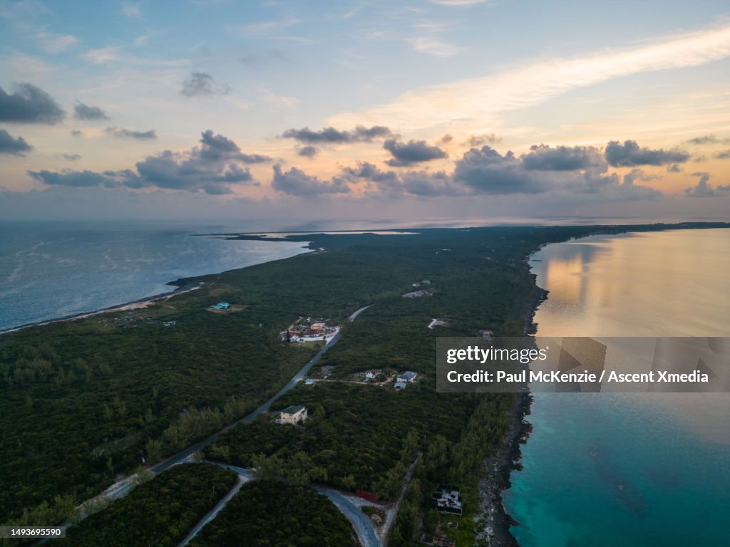 Aerial view of long, narrow island at sunrise