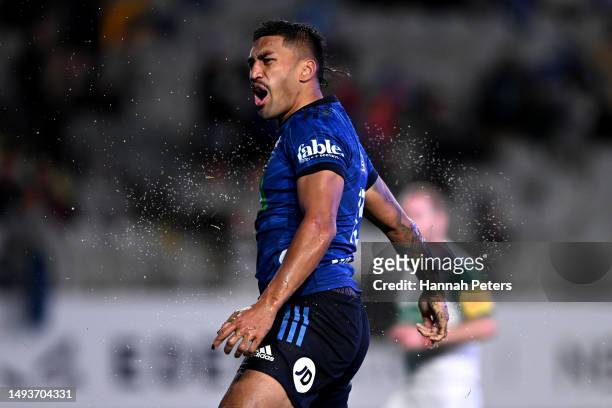 Rieko Ioane of the Blues celebrates after scoring a try during the round 14 Super Rugby Pacific match between Blues and Hurricanes at Eden Park, on...