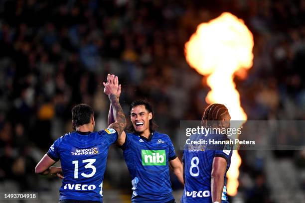 Rieko Ioane of the Blues celebrates after scoring a try with Zarn Sullivan of the Blues during the round 14 Super Rugby Pacific match between Blues...