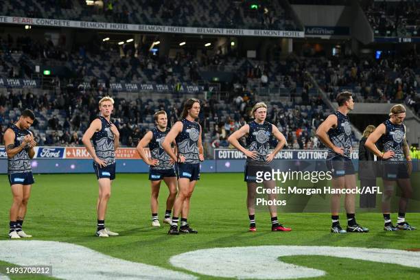 Cats players react following during the round 11 AFL match between Geelong Cats and Greater Western Sydney Giants at GMHBA Stadium, on May 27 in...