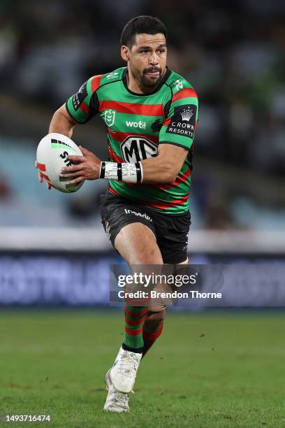 Cody Walker of the Rabbitohs runs the ball during the round 13 NRL match between South Sydney Rabbitohs and Canberra Raiders at Accor Stadium on May...