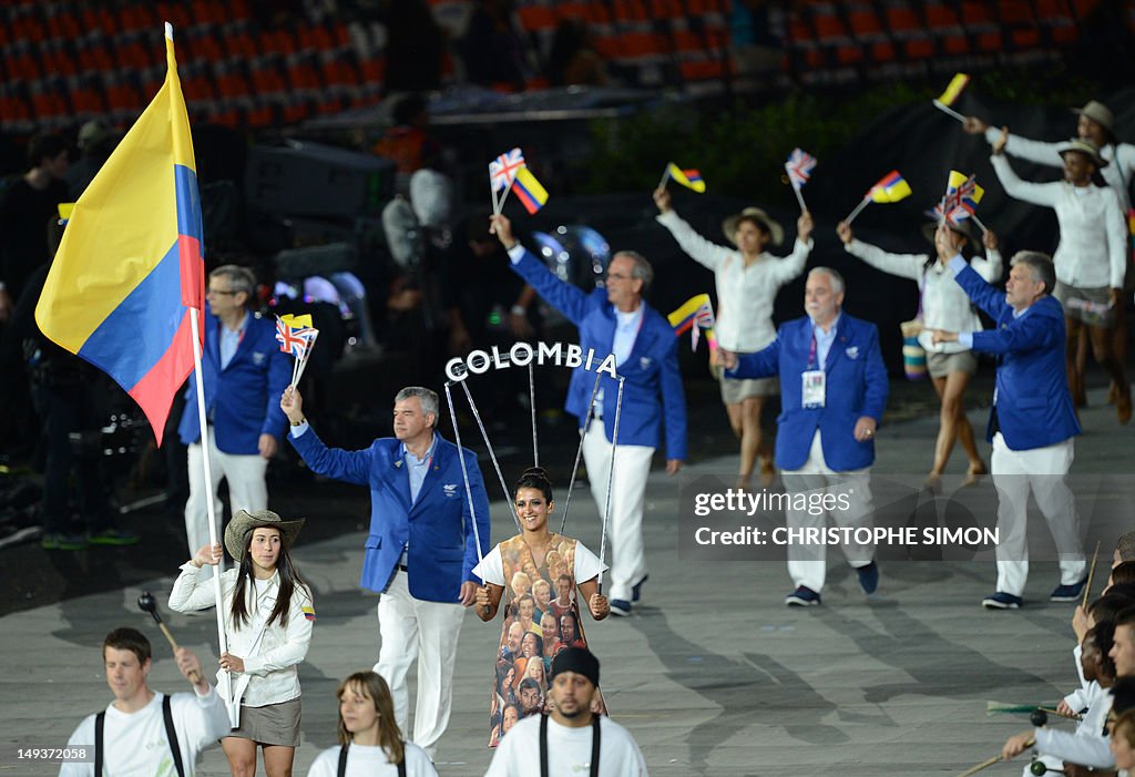 Colombia's flagbearer Mariana Pajon carr