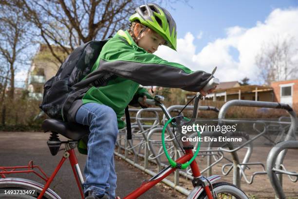 Kid Racking A Bike School Bike Rack Photos and Premium High Res Pictures - Getty Images
