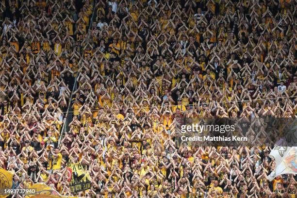 Fans of Dresden are pictured during the 3. Liga match between Dynamo Dresden and VfB Oldenburg at Rudolf-Harbig-Stadion on May 27, 2023 in Dresden,...