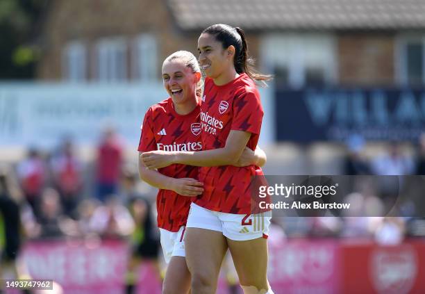 Noelle Maritz and Rafaelle Souza of Arsenal embrace during the warm up prior to the FA Women's Super League match between Arsenal and Aston Villa at...