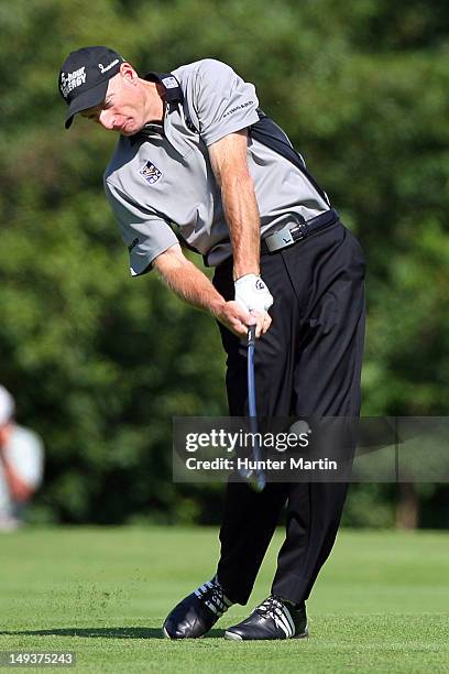 Jim Furyk of the USA hits his second shot on the 11th hole during the second round of the RBC Canadian Open at Hamilton Golf and Country Club on July...