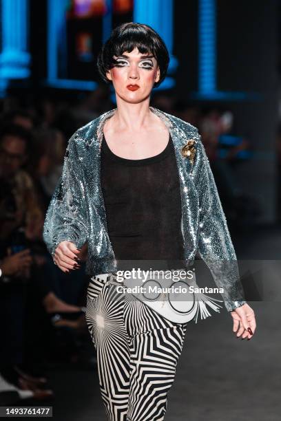 Model Johnny Luxo walks the runway at The Paradise fashion show during Sao Paulo Fashion Week N55 SPFW Fall/Winter 2024 at Komplexo Tempo on May 26,...