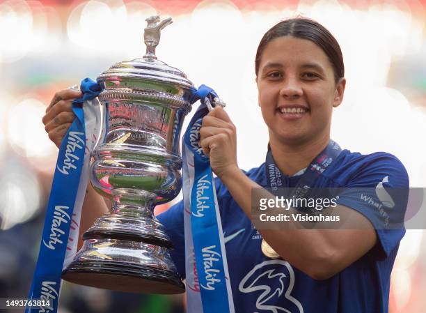 Sam Kerr of Chelsea holds up the FA Cup after the Vitality Women's FA Cup Final between Chelsea FC and Manchester United at Wembley Stadium on May...