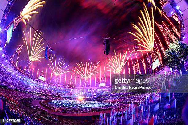 General View as fireworks illuminate the sky during the Opening Ceremony of the London 2012 Olympic Games at the Olympic Stadium on July 27, 2012 in...