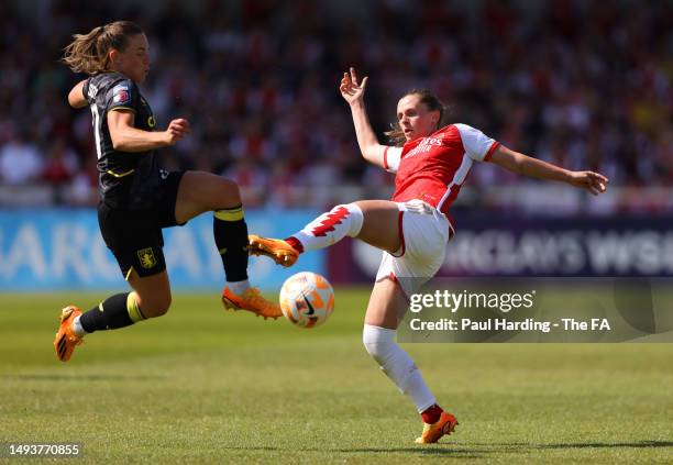Kirsty Hanson of Aston Villa and Noelle Maritz of Arsenal battle for possession during the FA Women's Super League match between Arsenal and Aston...