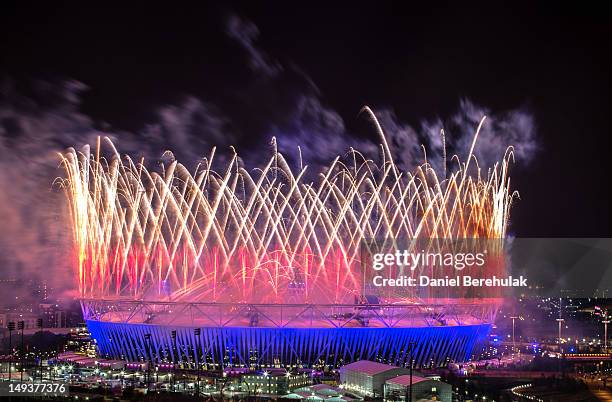 Fireworks explode over the Olympic Stadium during the opening ceremony of the 2012 London Olympic Games on July 27, 2012 in London, England....
