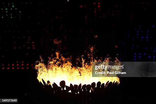 The Olympic Cauldron is lit during the Opening Ceremony of the London 2012 Olympic Games at the Olympic Stadium on July 27, 2012 in London, England.