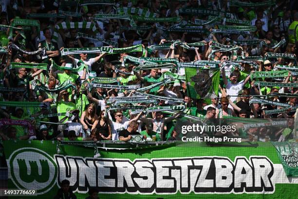 Fans of VfL Wolfsburg show their support prior to the Bundesliga match between VfL Wolfsburg and Hertha BSC at Volkswagen Arena on May 27, 2023 in...