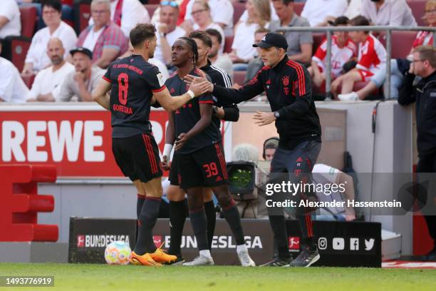 Mathys Tel of FC Bayern Munich replaces Leon Goretzka during the Bundesliga match between 1. FC Köln and FC Bayern München at RheinEnergieStadion on...