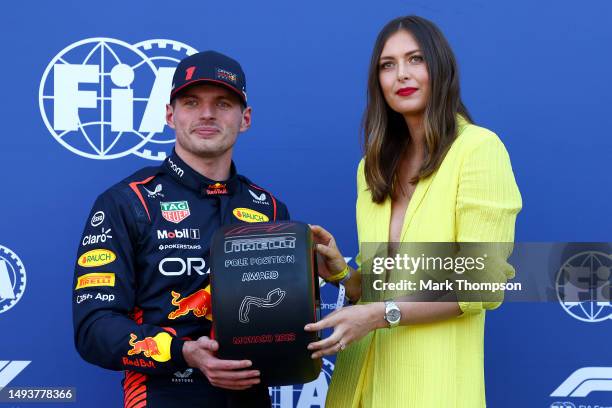 Pole position qualifier Max Verstappen of the Netherlands and Oracle Red Bull Racing is presented with the Pirelli Pole Position Award by Maria...