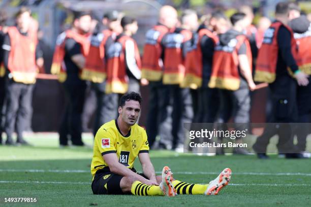 Mats Hummels of Borussia Dortmund looks dejected following the team's draw, as they finish second in the Bundesliga behind FC Bayern Munich during...
